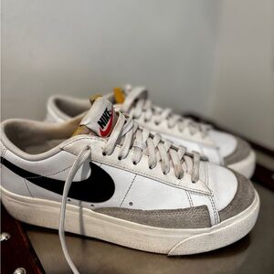 Nike White and Gray Sneakers with Black Swoosh